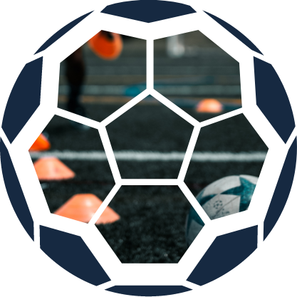 Cutout of training cones and a football